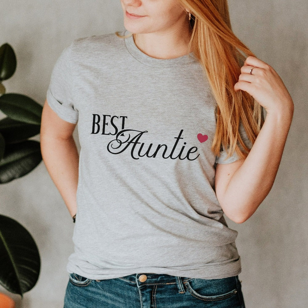 Show love and appreciation with this minimalist best auntie shirt. Whether it's for a family reunion, weekend visit, birthday or Christmas holidays, this adorable top is a thoughtful gift idea for your aunt. Makes a great memorable present from niece or nephew on her special day. This cute uplifting casual tee outfit for aunty is a great idea for a pregnancy reveal or new baby announcement surprise to your sister, family, sibling or best friend as the newest favorite funtie tia!