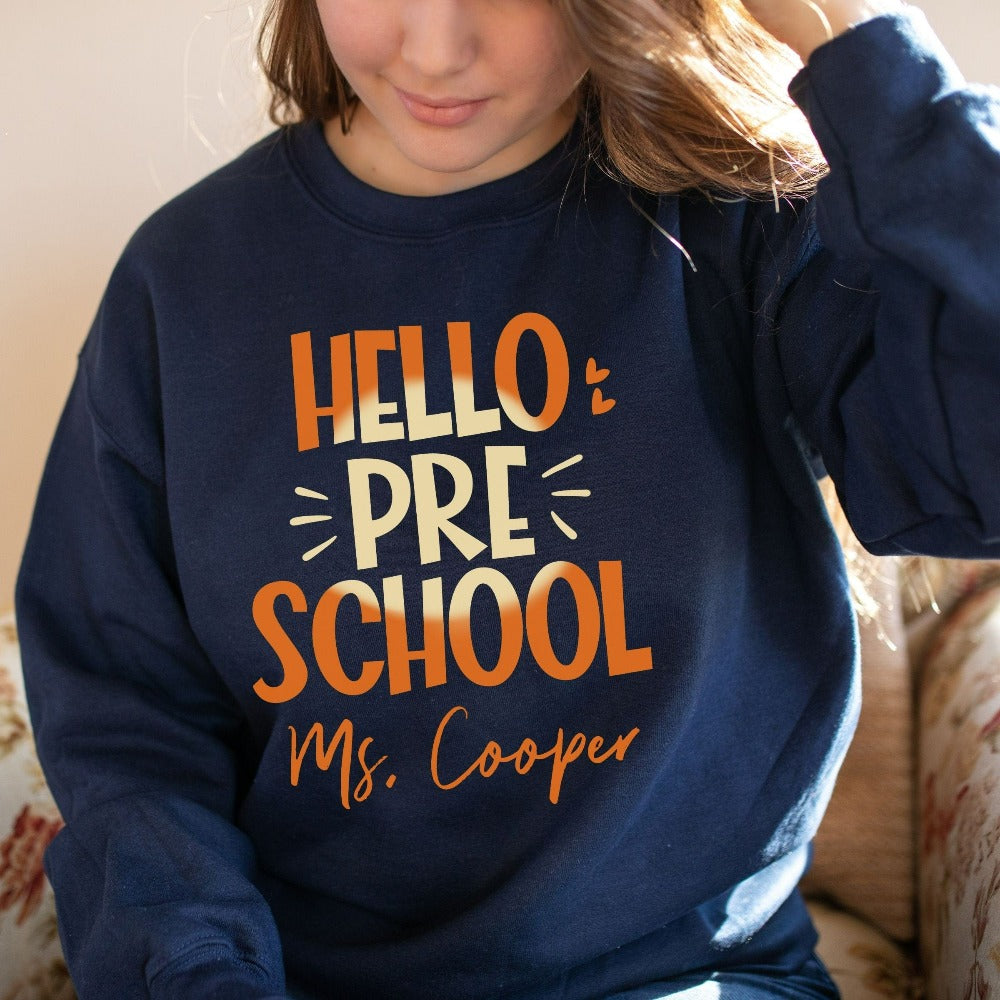 Hello Preschool! Customize this retro vibrant new grade sweatshirt as a thank you gift idea for teacher, trainer, instructor and homeschool mama. Create a custom look and show appreciation to your favorite grade teacher with this unique shirt. Perfect for elementary team spirit, back to school, last day of school, summer or spring break. Great outfit for everyday use both in and out of the classroom.
