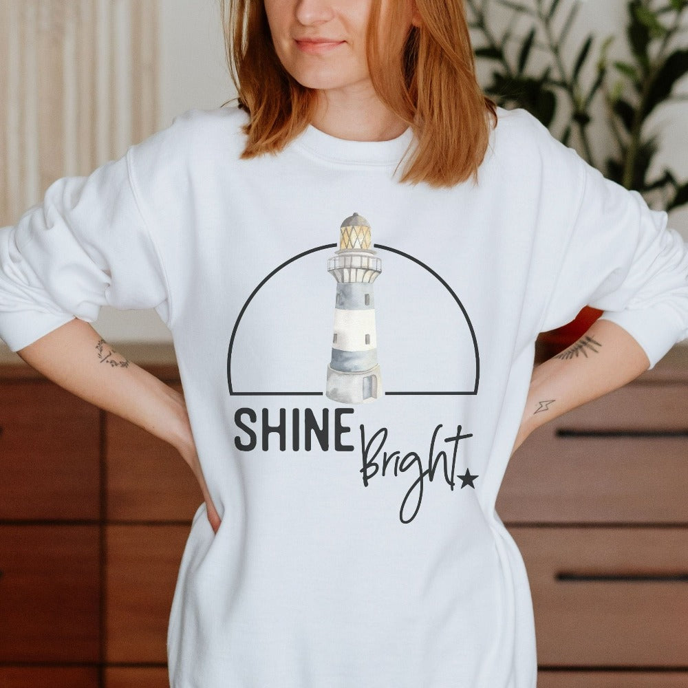 Shine bright in this coastal lighthouse sweatshirt. Spread positivity and motivational vibes with this gift idea that fits with multiple settings for mother, best friend, teenage or adult son, aunt, coworker or more. Unisex, soft and comfy. Great motivational birthday, Christmas holiday, Thanksgiving, Mother's Day present for mom, daughter, best friend, sister or co-worker.