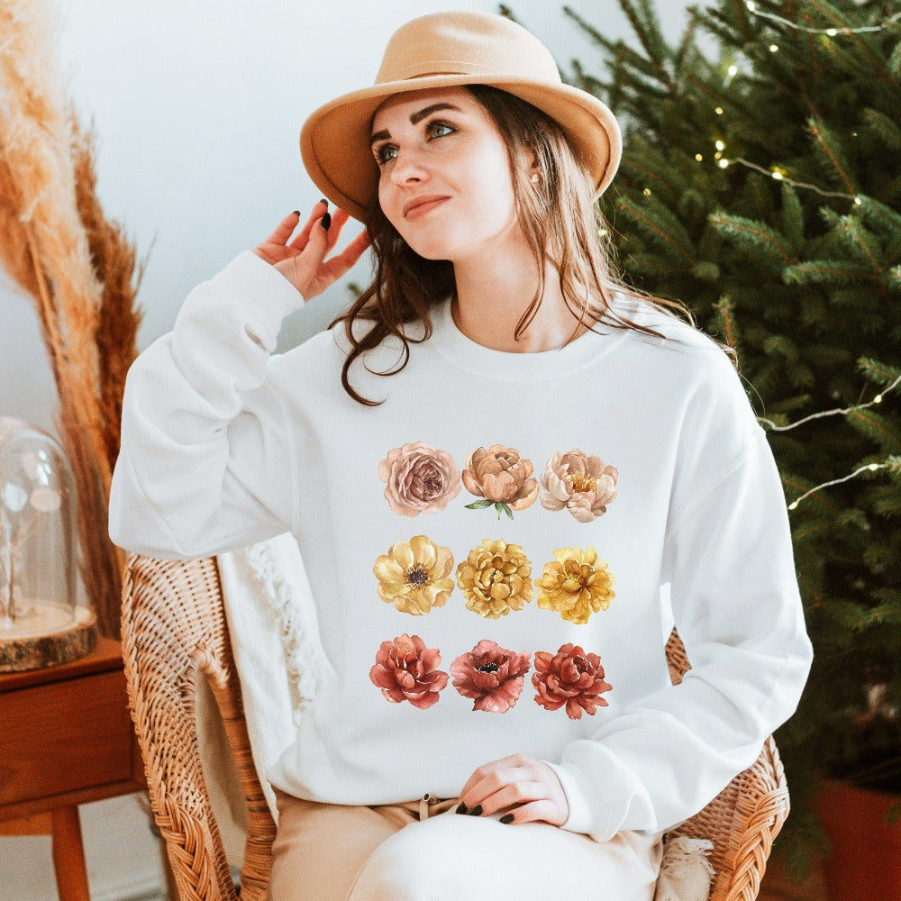 Bright, beautiful, simple and elegant. This boho botanical floral sweatshirt is another favorite. The watercolor flower arrangement in pastel colors makes this graphic shirt unique and beautiful. Perfect gift idea for birthday, Christmas holiday, Mother's Day, Thanksgiving or anniversary. This top works both as a comfy weekend stay at home lounge wear or as a casual outfit for everyday outdoor use.