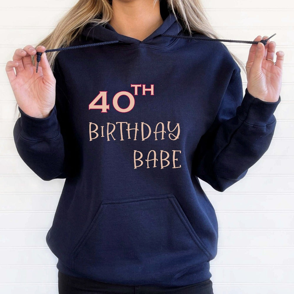 Say Hello 40 with this cute gift outfit for the 40th birthday babe. Celebrate the fabulous forty with your crew and stand out with a fun party hoodie. This is a great present for the 40 year old queen, sister, mom, daughter or best friend. It makes for a memorable new age celebration hoodie,
