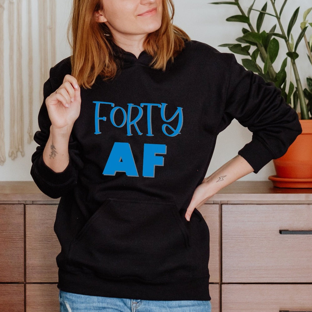 Say Hello to 40 with this fun birthday gift idea for yourself or a loved one. Perfect present for the 40th birthday girl, mom, daughter, son, friend, babe or co-worker. Soft cozy hoodie stands out with a vibrant look and makes this cute party shirt great for both indoor and outdoor wear.