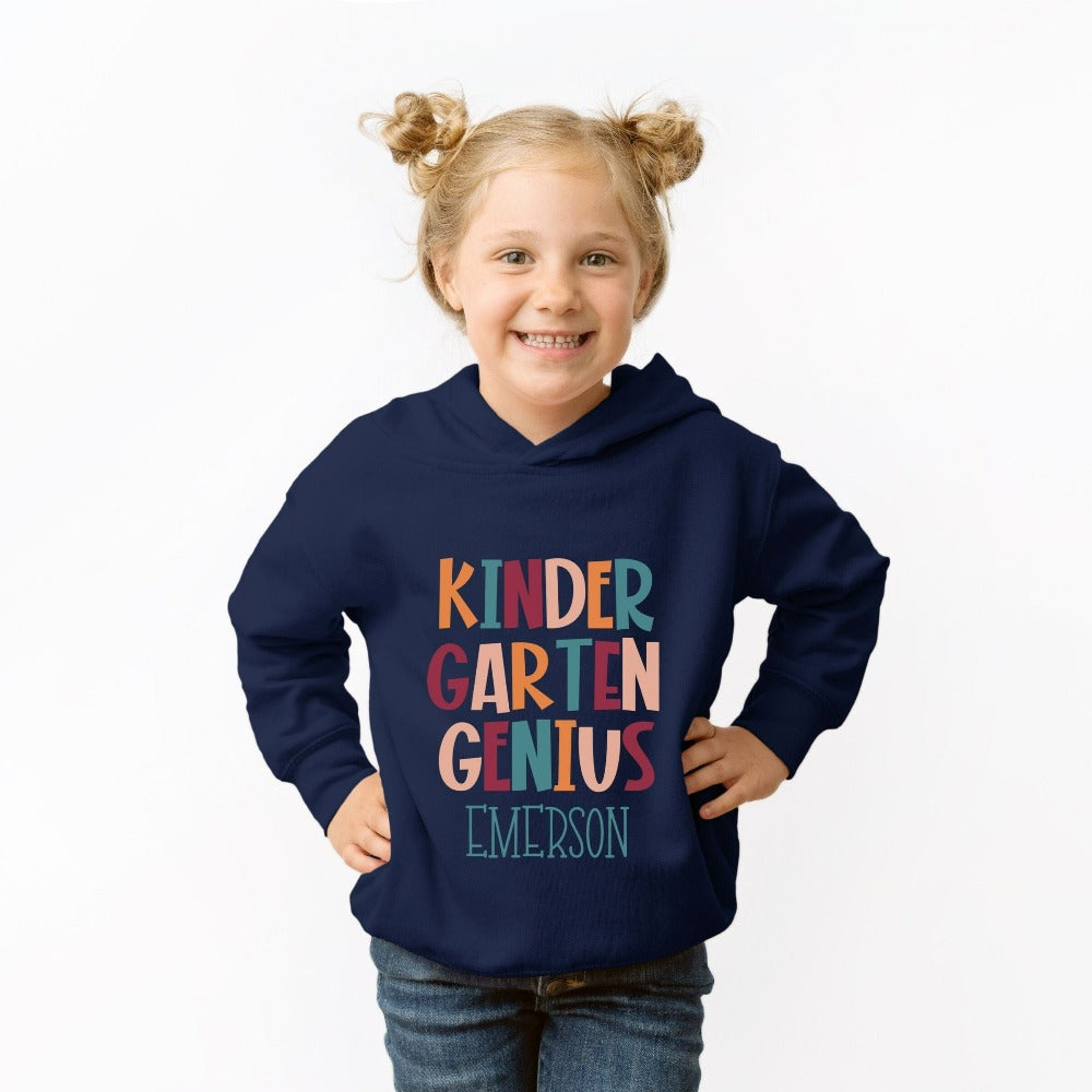 Customize this kindergarten, back to school sweatshirt gift idea for your genius. For first day of school, school field trips, 100 days of school, graduation or a new grade. Perfect name shirt outfit for everyday use in or out of classroom. Kinder Garten hoodie.