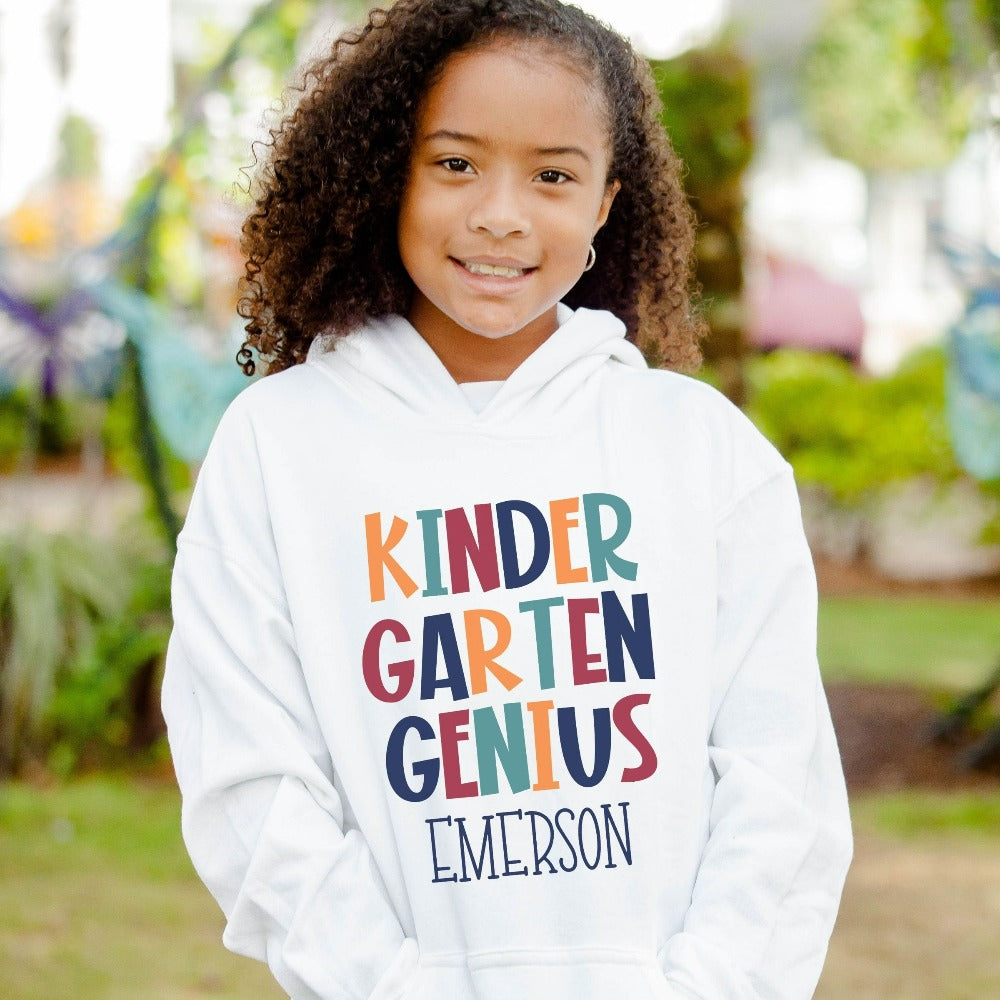Customize this kindergarten, back to school sweatshirt gift idea for your genius. For first day of school, school field trips, 100 days of school, graduation or a new grade. Perfect name shirt outfit for everyday use in or out of classroom. Kinder Garten hoodie.