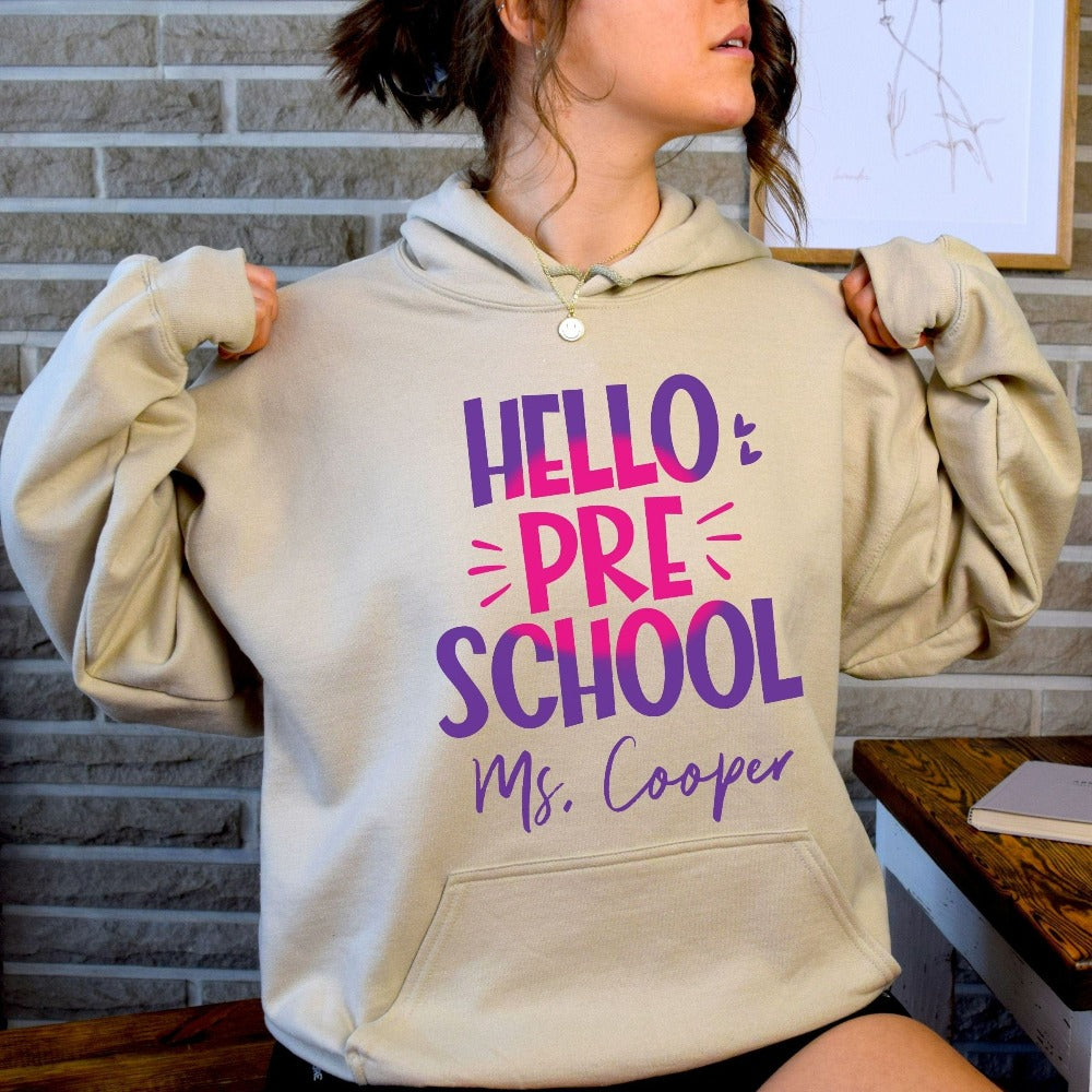 Hello Preschool! Customize this retro vibrant new grade sweatshirt as a thank you gift idea for teacher, trainer, instructor and homeschool mama. Create a custom look and show appreciation to your favorite grade teacher with this unique shirt. Perfect for elementary team spirit, back to school, last day of school, summer or spring break. Great outfit for everyday use both in and out of the classroom.
