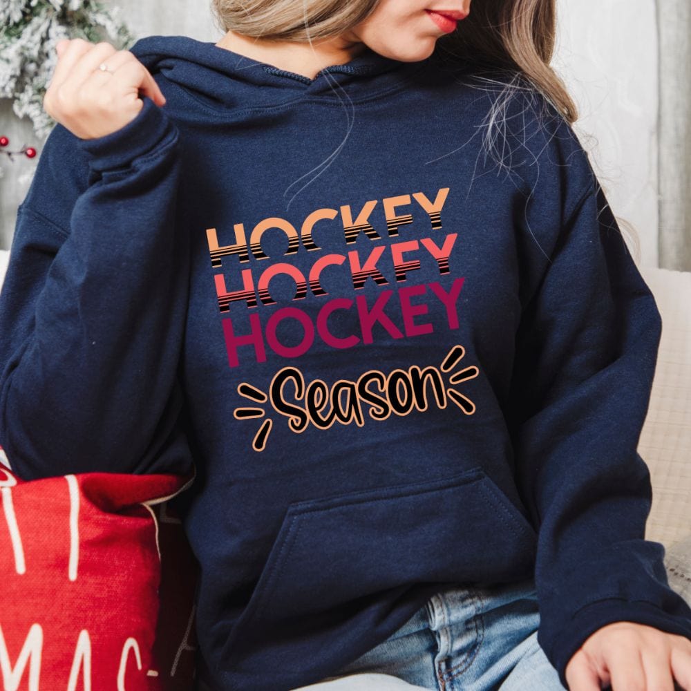 This empowered hockey season hoodie is a perfect gift idea for women. A cute sports hoodie outfit for hockey lover and player during hockey season competition. An ideal gift for mom, wife and grandma on birthday and Christmas.