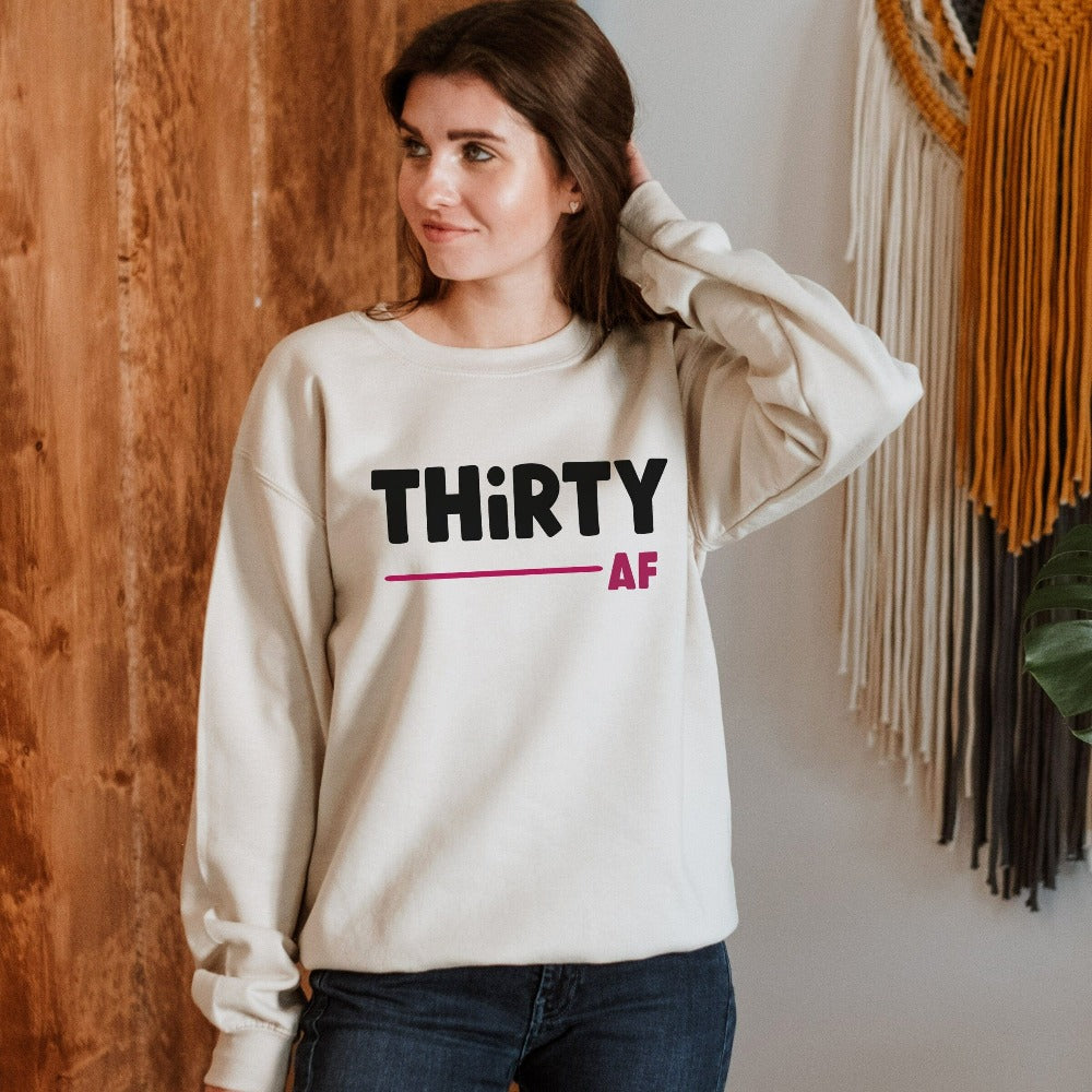 "Hello Thirty". Planning of a birthday celebration? Let's get this trendy thirty sweatshirt as a female matching outfit on 30th birthday for yourself, mom, sister, daughter and bestfriend. A fabulous outfit for any birthday celebration ideas like a party or road trip.  