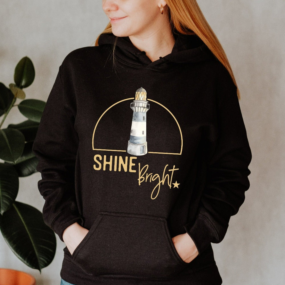 Shine bright in this coastal lighthouse hoodie. Spread positivity and motivational vibes with this gift idea that fits with multiple settings for mother, best friend, teenage or adult son, aunt, coworker or more. Unisex, soft and comfy. Great motivational birthday, Christmas holiday, Thanksgiving, Mother's Day present for mom, daughter, best friend, sister or co-worker.