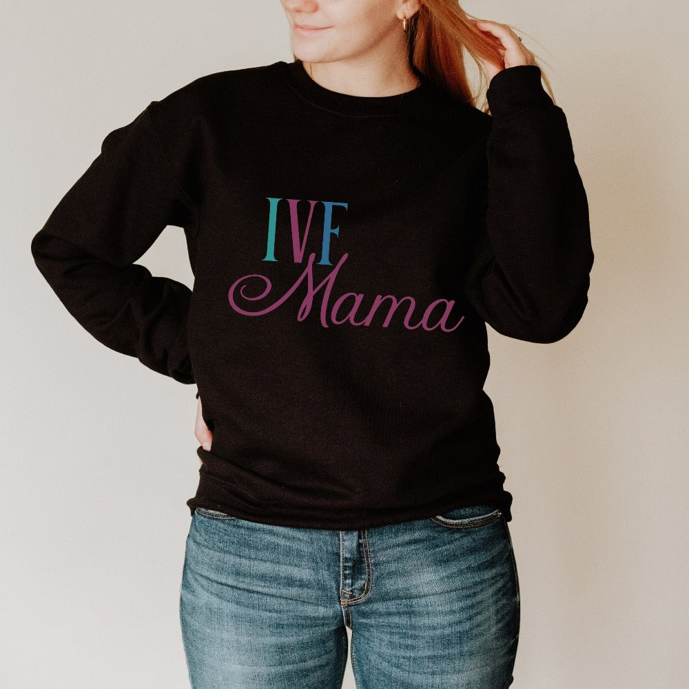 IVF Mama fertility treatment support gift idea for new mom's transfer day. Perfect sweatshirt for family baby announcement for BFP (big fat positive) TTC (trying to conceive) journey. Celebrate with the newest coolest mom in your life with this cute trendy baby reveal, announcement or baby shower present for the embryo warrior you know!