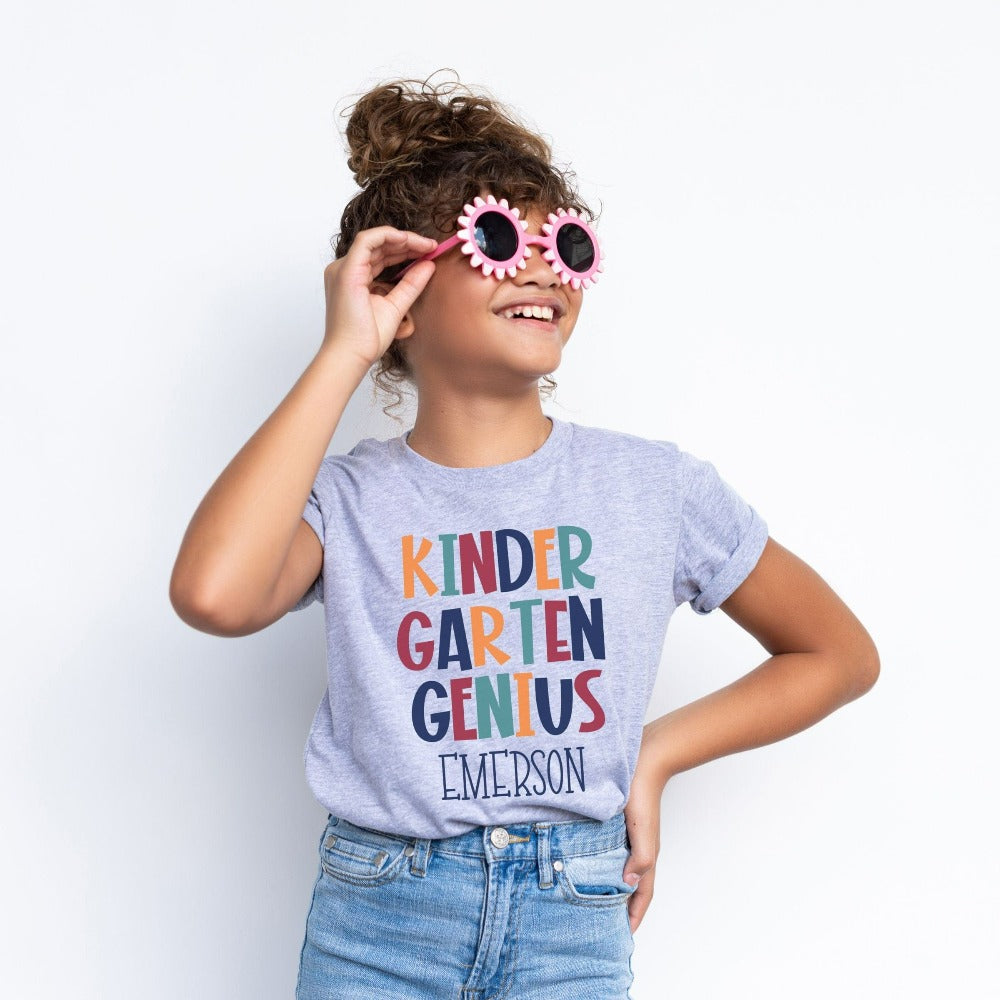 Customize this kindergarten, back to school shirt gift idea for your genius. For first day of school, school field trips, 100 days of school, graduation or a new grade. Perfect name tee outfit for everyday use in or out of classroom. Kinder Garten t-shirt.