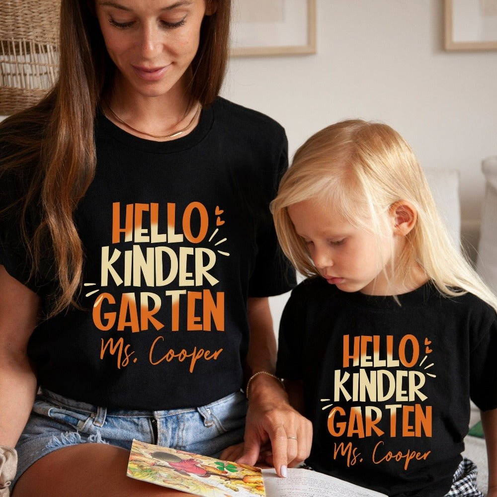 Hello Kindergarten! Customize this retro vibrant new grade shirt as a thank you gift idea for teacher, trainer, instructor and homeschool mama. Create a custom look and show appreciation to your favorite grade teacher with this unique shirt. Perfect for elementary team spirit, back to school, last day of school, summer or spring break. Great outfit for everyday use both in and out of the classroom.