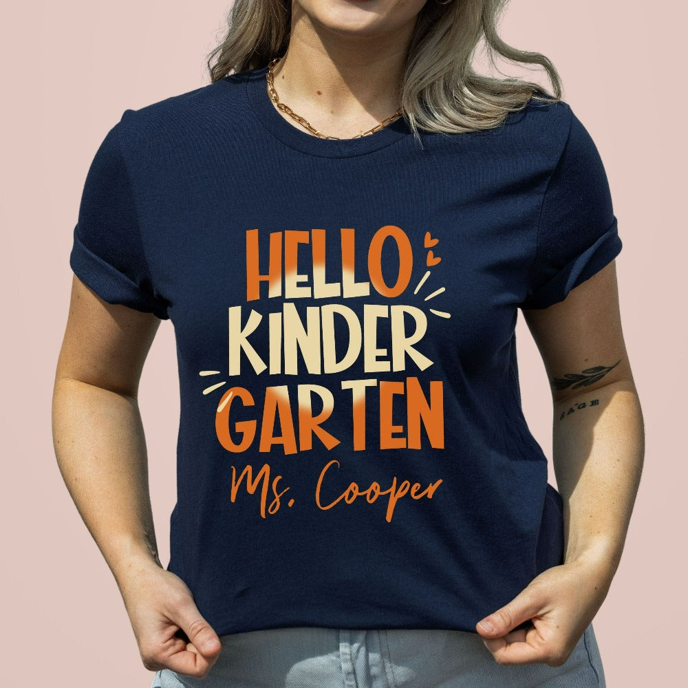 Hello Kindergarten! Customize this retro vibrant new grade shirt as a thank you gift idea for teacher, trainer, instructor and homeschool mama. Create a custom look and show appreciation to your favorite grade teacher with this unique shirt. Perfect for elementary team spirit, back to school, last day of school, summer or spring break. Great outfit for everyday use both in and out of the classroom.
