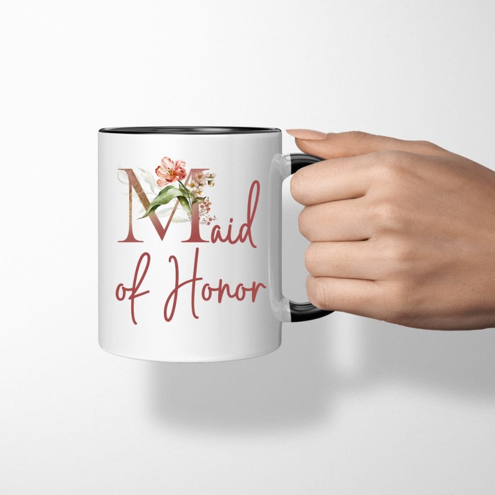 Floral maid of honor wedding party coffee mug souvenir for matron of honor. Great idea for engagement announcement, bachelorette party, bridesmaid proposal box gift idea, rehearsal dinner, and after wedding parties. This cute getting ready present is a perfect addition for the bride's crew, team or squad.