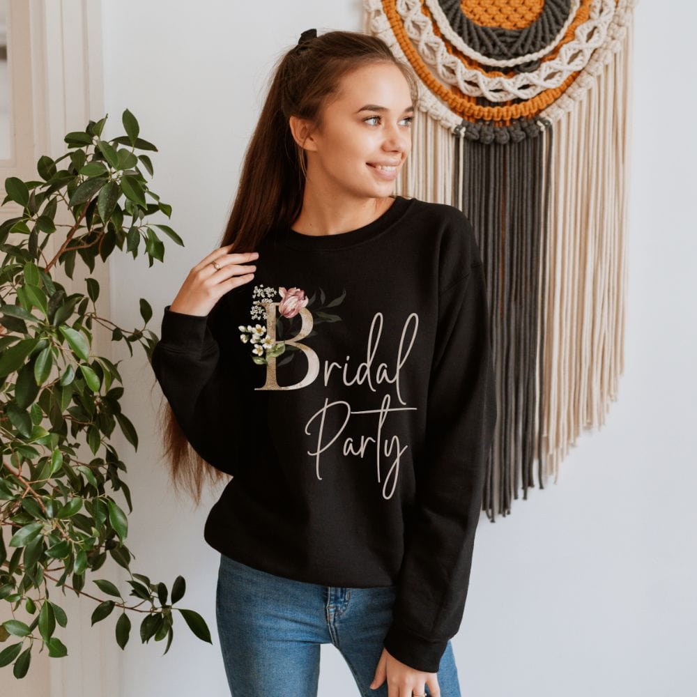 Floral bridal party sweatshirt for maid of honor, bride team, bridesmaids, mother of the bride or groom and wedding party. Great idea for engagement announcement, bachelorette party, bridesmaid proposal box gift idea, rehearsal dinner, and after wedding parties. This cute getting ready outfit is a perfect addition for the bride's crew, team or squad.