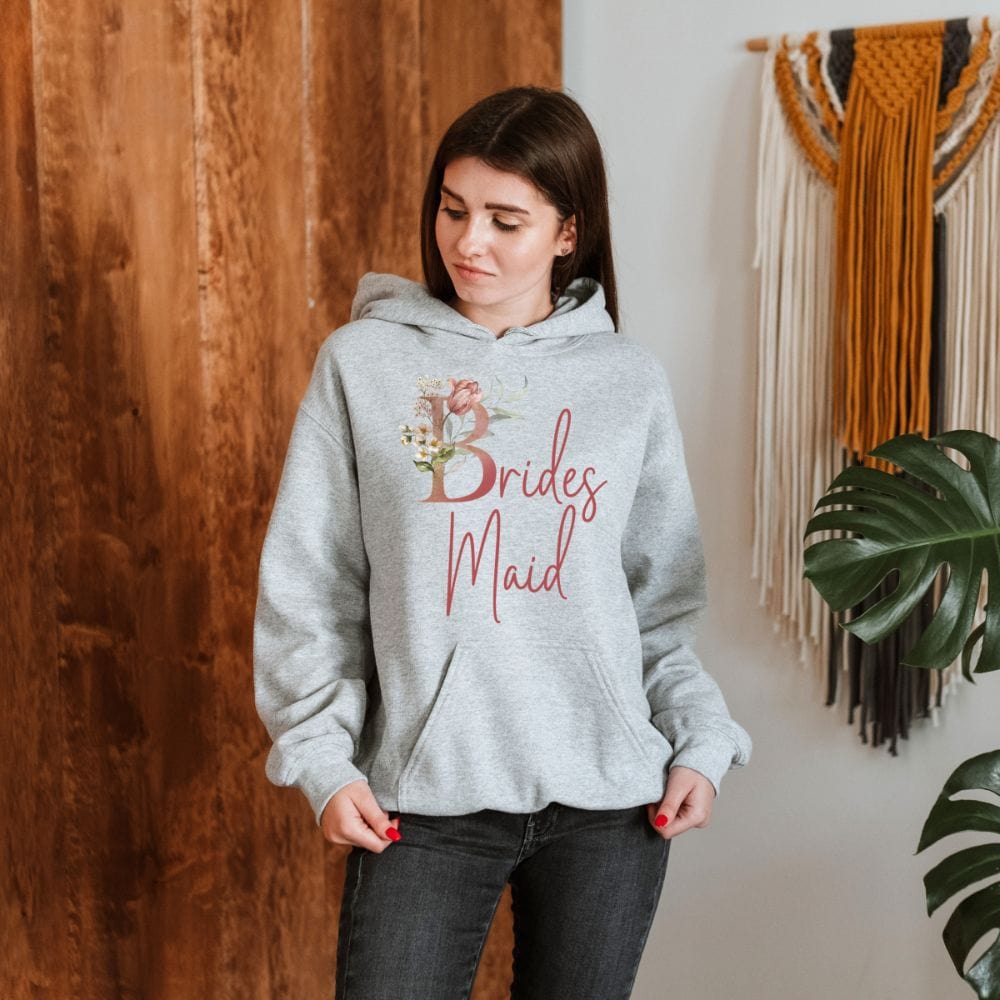 Floral bridal party hoodie for bridesmaid, BFF and bestie team on your wedding. Great idea for engagement announcement, bachelorette party, bridesmaid proposal box gift idea, rehearsal dinner, and after wedding parties. This cute getting ready present is a perfect addition for the bride's crew, team or squad.