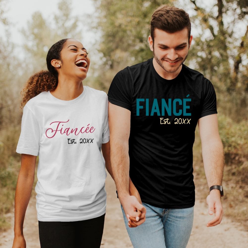 Fiancé and fiancée matching couples shirt. Getting ready for a honeymoon vacation, family reunion cruise to celebrate your engagement? This his and hers matching outfit is always a hit. Customized with date, it is a perfect bridal party wedding gift idea for bride and groom. Also great as a welcome gift for future soon-to-be daughter-in-law or son-in-law and new Mr. and Mrs.