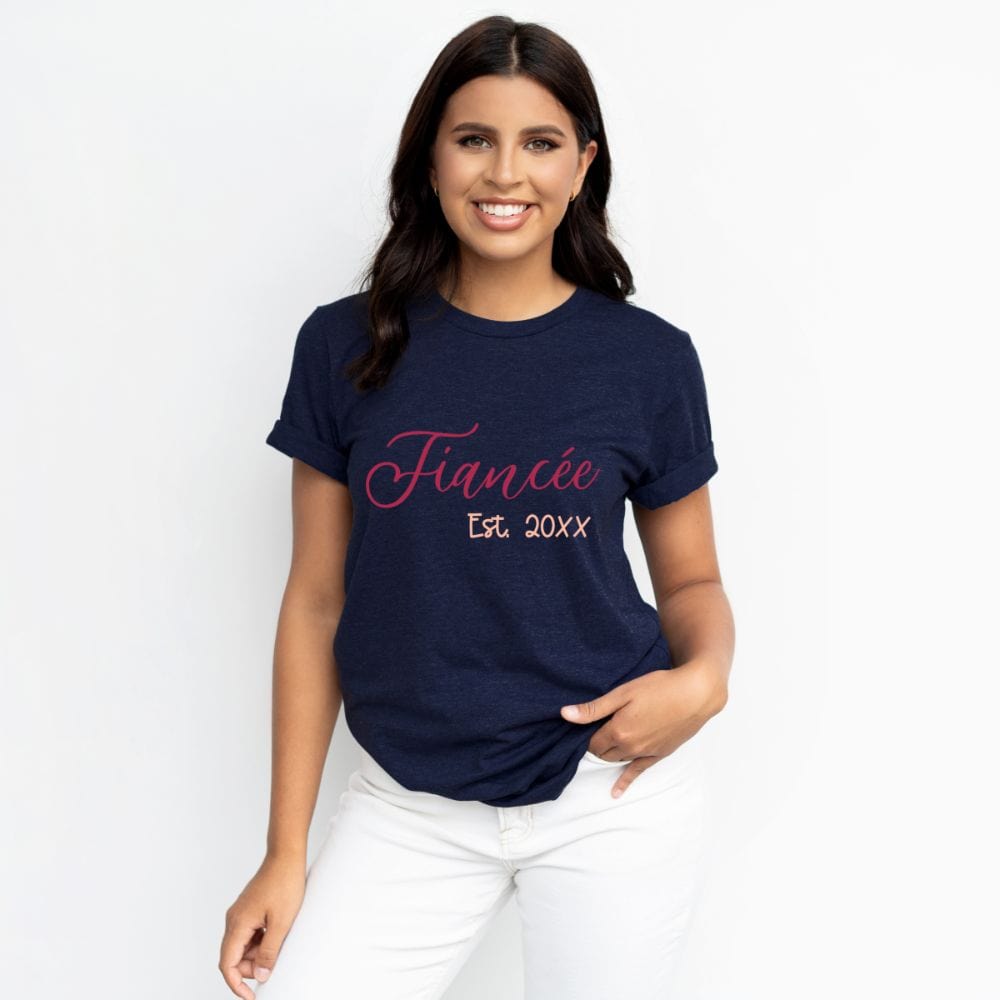 Fiancé and fiancée matching couples shirt. Getting ready for a honeymoon vacation, family reunion cruise to celebrate your engagement? This his and hers matching outfit is always a hit. Customized with date, it is a perfect bridal party wedding gift idea for bride and groom. Also great as a welcome gift for future soon-to-be daughter-in-law or son-in-law and new Mr. and Mrs.