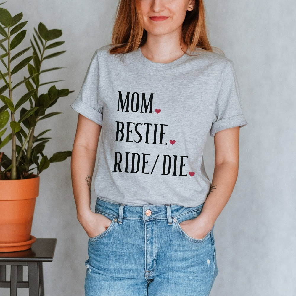 Mom Bestie casual tee. Celebrate mama and family with this shirt perfect for Mother's Day. This is a great baby announcement gift idea or baby shower present for the new mom. Also makes for a nice appreciative holiday gift from daughter or son.