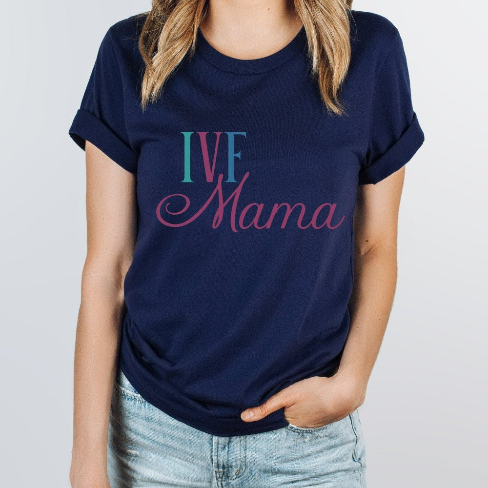 IVF Mama fertility treatment support gift idea for new mom's transfer day. Perfect casual shirt outfit for family baby announcement for BFP (big fat positive) TTC (trying to conceive) journey. Celebrate with the newest coolest mom in your life with this cute trendy baby reveal, announcement or baby shower present for the embryo warrior you know!