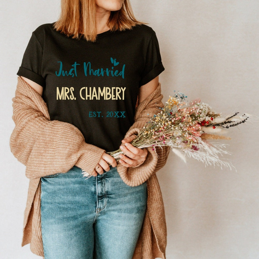 Grab this adorable wedding souvenir for the newest bride to be. Customized with name and date, this cute gift idea is perfect for a bridal shower present for the soon to be Mrs or engagement anniversary gift for wife/spouse. Custom personalized shirt outfit.