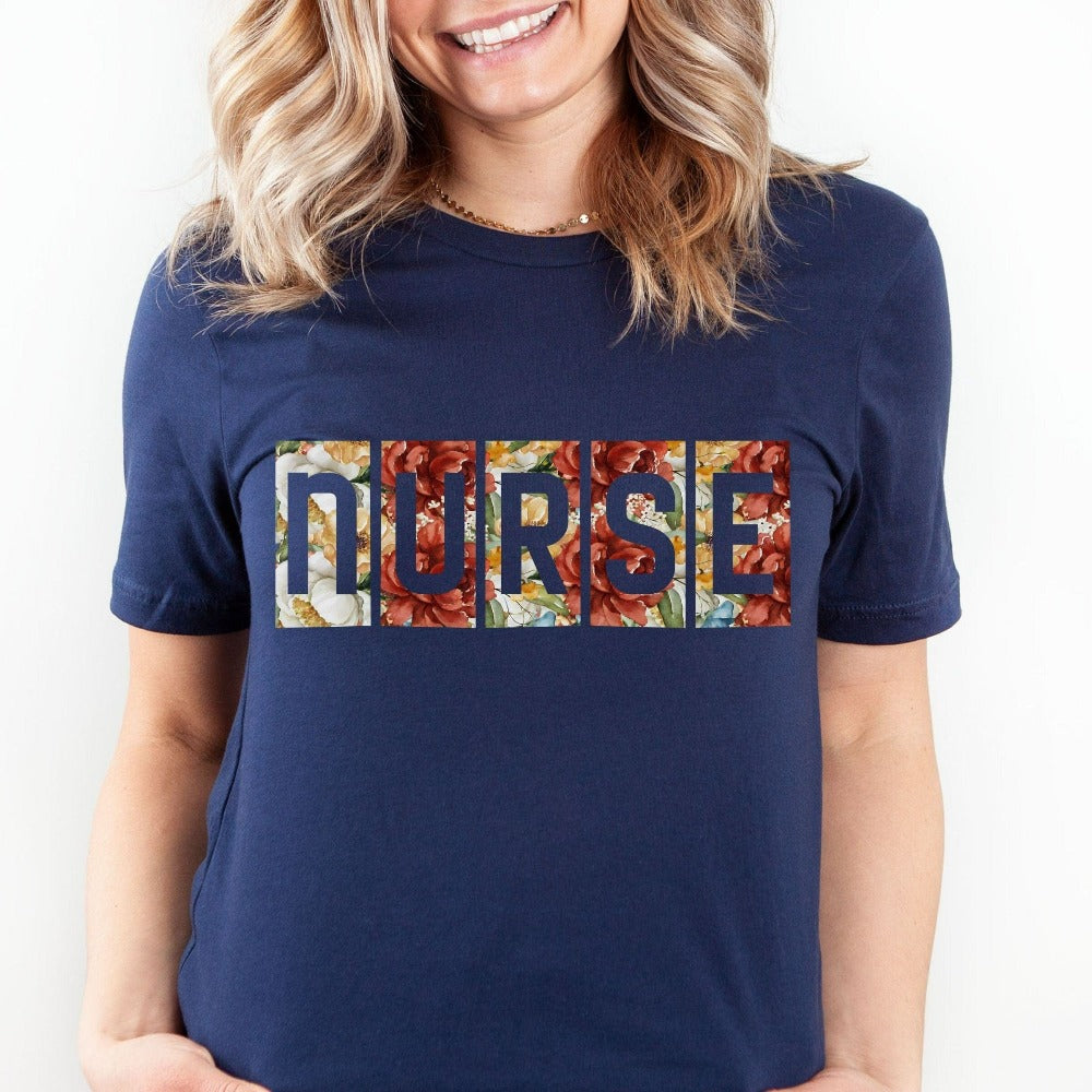 Floral Nurse shirt. This adorable gift idea works for Nursing Graduate, New Nurse, Emergency Department, Operating Theatre, Neonatal NICU, ICU, RN and more. Perfect appreciation thank you tee gift for hospital ward favorite nurse team, surgical unit crew and co-workers. Great staff casual top for both night and day shifts.