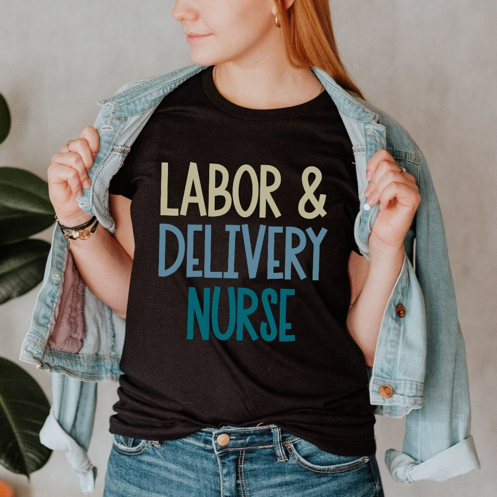 Labor and Delivery Nurse shirt. This gift idea is perfect for L&D Department Unit Nursing Graduate, New LD Ward Nurse whether as a birthday gift, graduation gift, thank you appreciation gift or Christmas holidays stocking stuffer. Perfect staff casual work tee for day and night hospital ward shifts.
