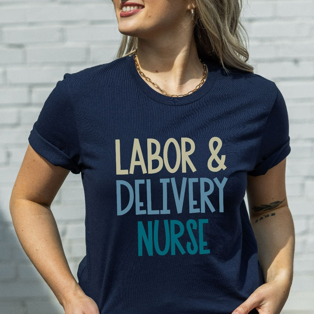 Labor and Delivery Nurse shirt. This gift idea is perfect for L&D Department Unit Nursing Graduate, New LD Ward Nurse whether as a birthday gift, graduation gift, thank you appreciation gift or Christmas holidays stocking stuffer. Perfect staff casual work tee for day and night hospital ward shifts.