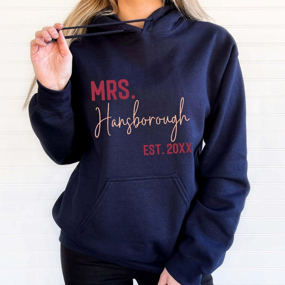 Grab this adorable wedding sweatshirt for the newest bride to be. Customized with name and date, this cute gift idea is perfect for a bridal shower present for the soon to be Mrs. or engagement anniversary gift for wife/spouse. Custom personalized bachelorette shirt outfit.