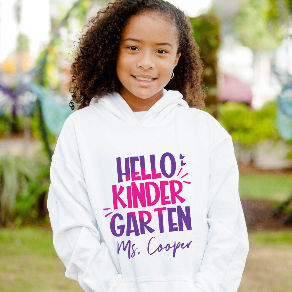 Hello Kindergarten! Customize this retro vibrant new grade sweatshirt as a thank you gift idea for teacher, trainer, instructor and homeschool mama. Create a custom look and show appreciation to your favorite grade teacher with this unique shirt. Perfect for elementary team spirit, back to school, last day of school, summer or spring break. Great outfit for everyday use both in and out of the classroom.