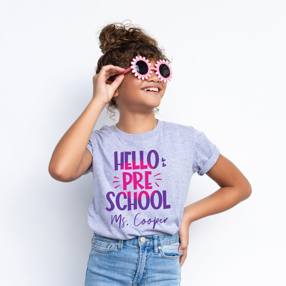 Hello Preschool! Customize this retro vibrant new grade shirt as a thank you gift idea for teacher, trainer, instructor and homeschool mama. Create a custom look and show appreciation to your favorite grade teacher with this unique shirt. Perfect for elementary team spirit, back to school, last day of school, summer or spring break. Great outfit for everyday use both in and out of the classroom.