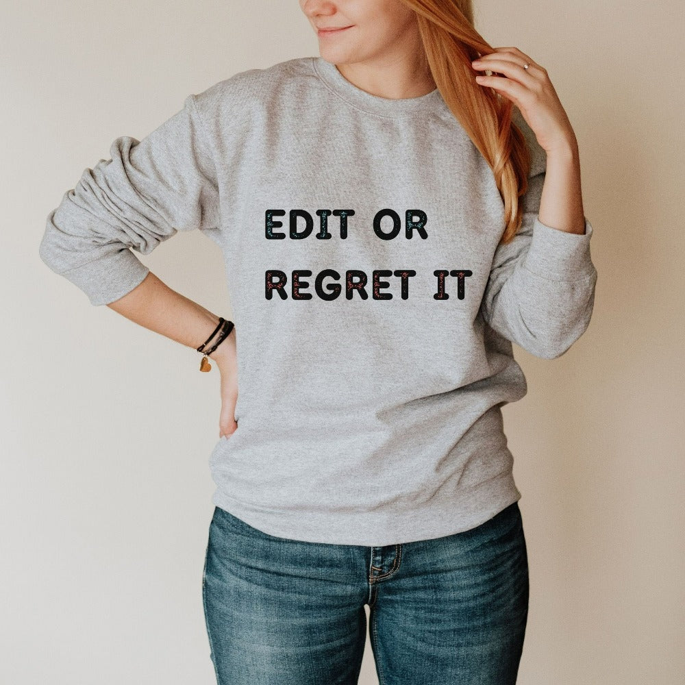 Funny book lover, poet, editor, writer, English literature teacher, reading club or librarian gift idea. This Edit it or Regret it humorous saying is a great expressive quote on a cozy sweatshirt. It always becomes the center of great conversation and a favorite for literacy groups.