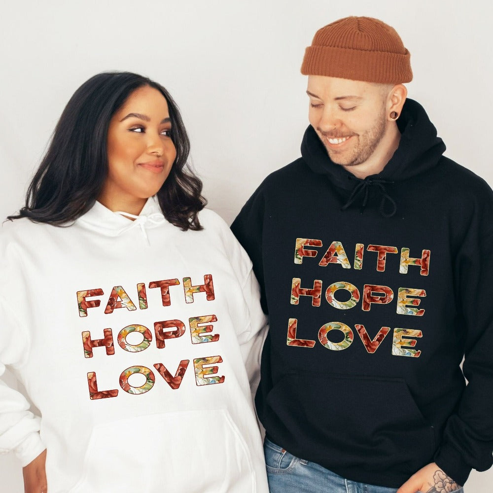 Positive Christian faith based gift idea outfit for religious friend or loved one. Bible verse and 1st Corinthians 13 quote - Faith, Hope and Love saying. Great matching floral sweatshirt for a church convention, Sunday school or weekend service. Grab this for a birthday shirt for youth pastor or leader, minister or any other Christian family.