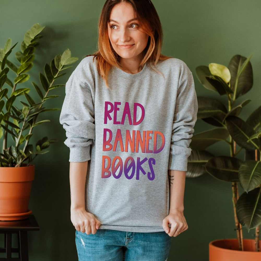 Funny book lover, English literature teacher, reading club or librarian gift idea. This Read Banned Books Humorous saying is a great expressive quote on a cozy sweatshirt. It always becomes the center of great conversation and a favorite for writers.