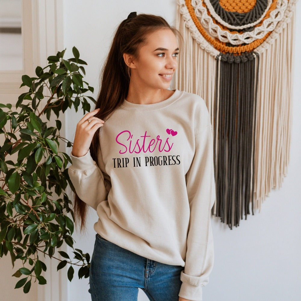 Matching sisters trip in progress sweatshirt for your next vacation travels. This is a cute cozy hoodie for cruise vacations, family camping reunion, girls road trip, island beach weekend getaways or airport lounge apparel. Get in the vacay mood and enjoy the best time ever with your sister or best friend.