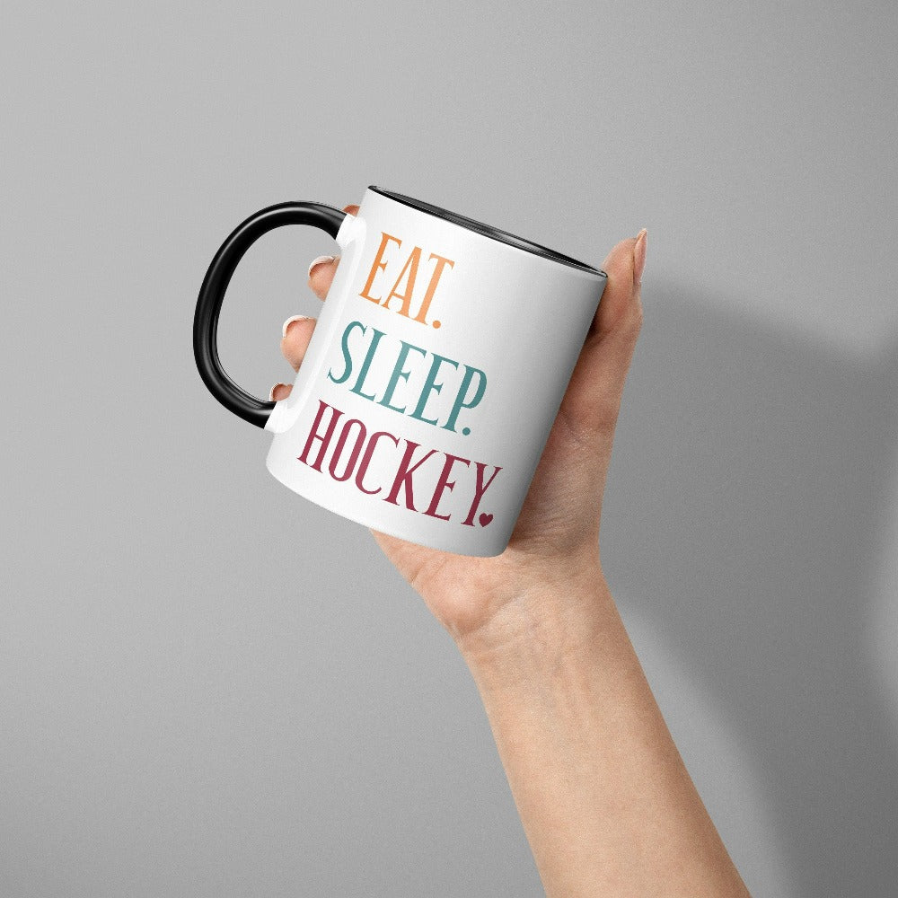 Eat, Sleep, Hockey coffee mug. It's always sports season depending on how you play. This playful hockey gift idea for your favorite athlete or hockey mom is bright and cheerful. Great for cheering on your team, getting ready for practice, heading out for a match and being the number one fan you have always been. Perfect hockey mom or dad birthday present.