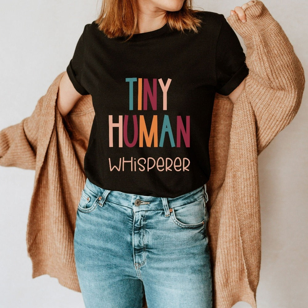 Tiny Humans Whisperer funny gift idea for teacher, trainer, instructor and homeschool mama. Show appreciation to your favorite grade teacher with this retro bold and colorful humorous shirt. Perfect for elementary, middle or high school, back to school, last day of school, summer or spiring break. Great for everyday use both in and out of the classroom.