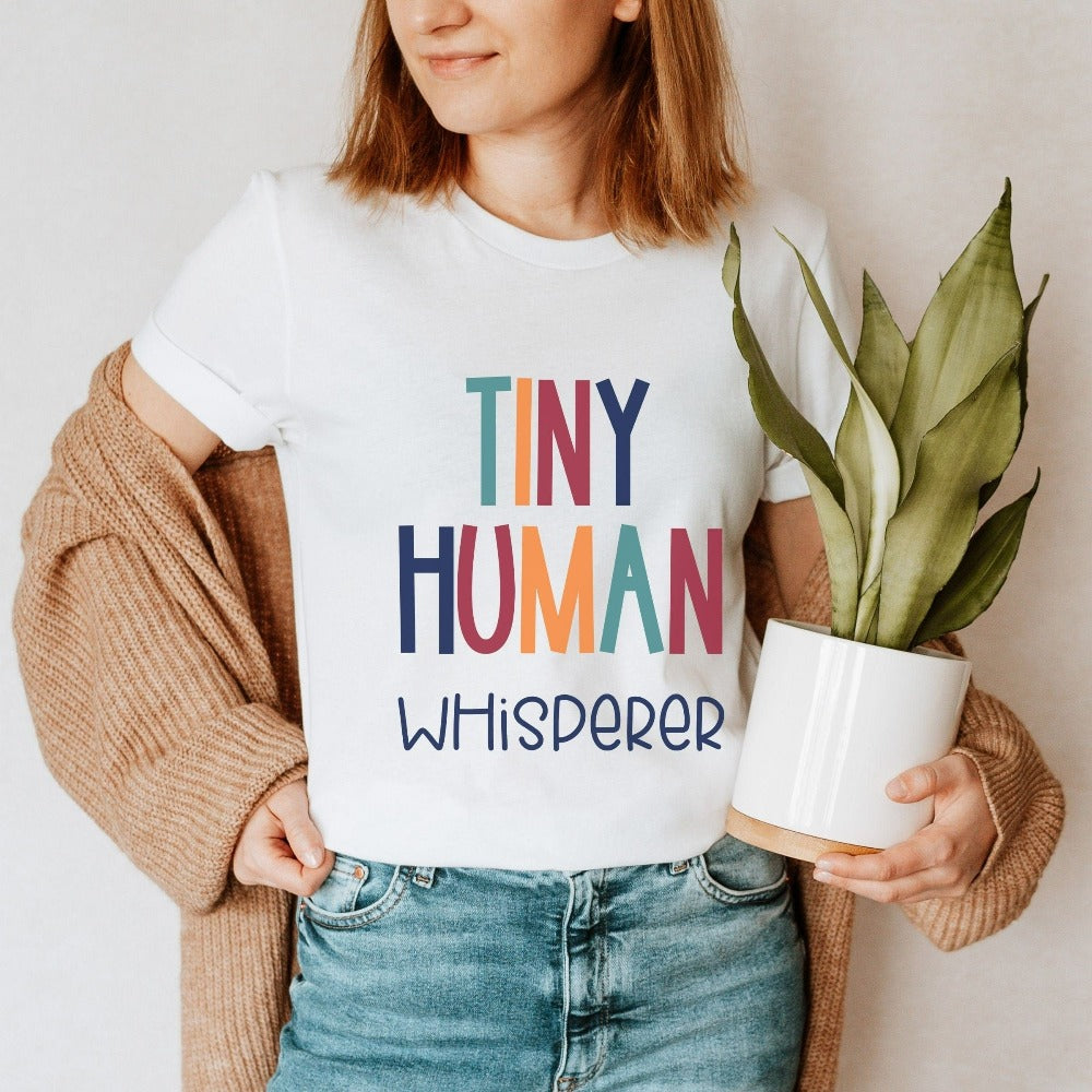 Tiny Humans Whisperer funny gift idea for teacher, trainer, instructor and homeschool mama. Show appreciation to your favorite grade teacher with this retro bold and colorful humorous shirt. Perfect for elementary, middle or high school, back to school, last day of school, summer or spiring break. Great for everyday use both in and out of the classroom.