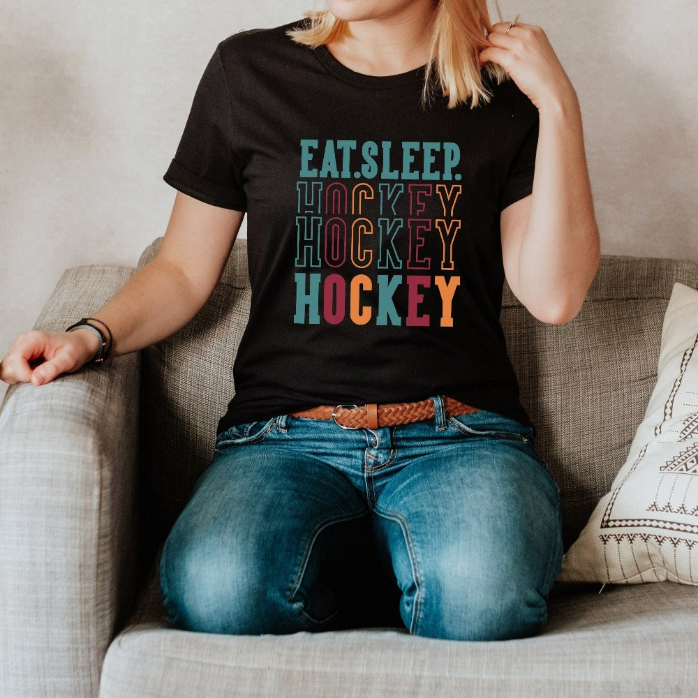Eat, Sleep, Hockey shirt. It's always sports season depending on how you play. This playful hockey gift idea for your favorite athlete or soccer mom is bright and cheerful. Great for cheering on your team, getting ready for practice, heading out for a match and being the number one fan you have always been. Perfect hockey mom or dad casual tee outfit.