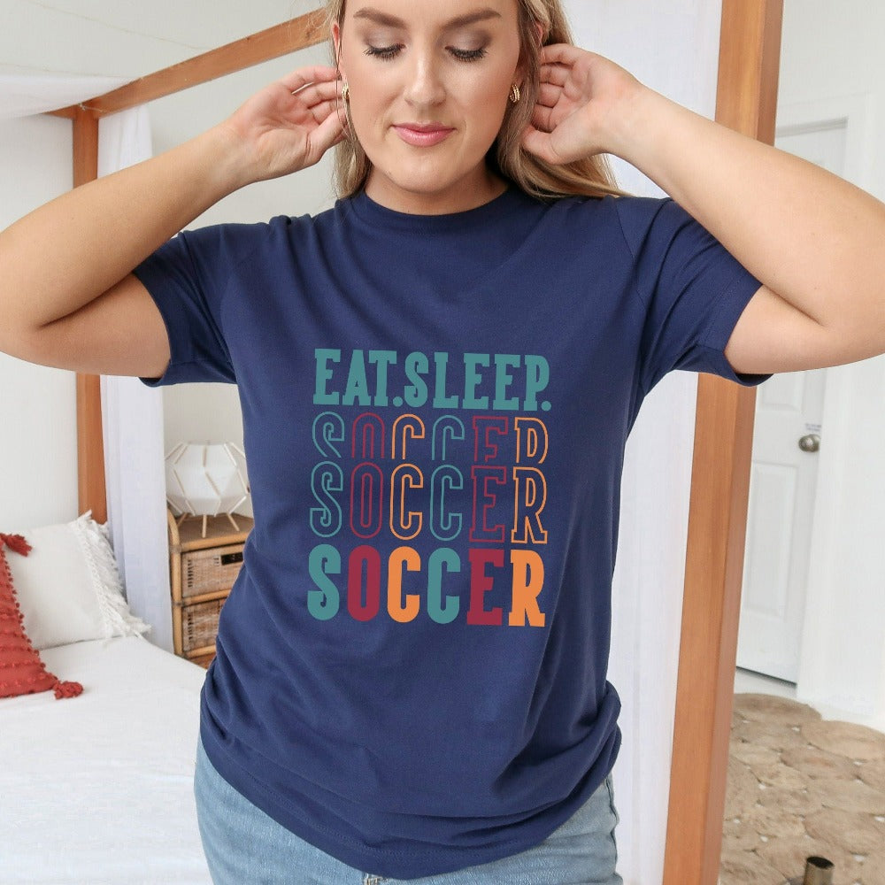 Eat, Sleep, Soccer shirt. It's always sports season depending on how you play. This playful soccer gift idea for your favorite athlete or soccer mom is bright and cheerful. Great for cheering on your team, getting ready for practice, heading out for a match and being the number one fan you have always been. Perfect soccer mom or dad outfit.