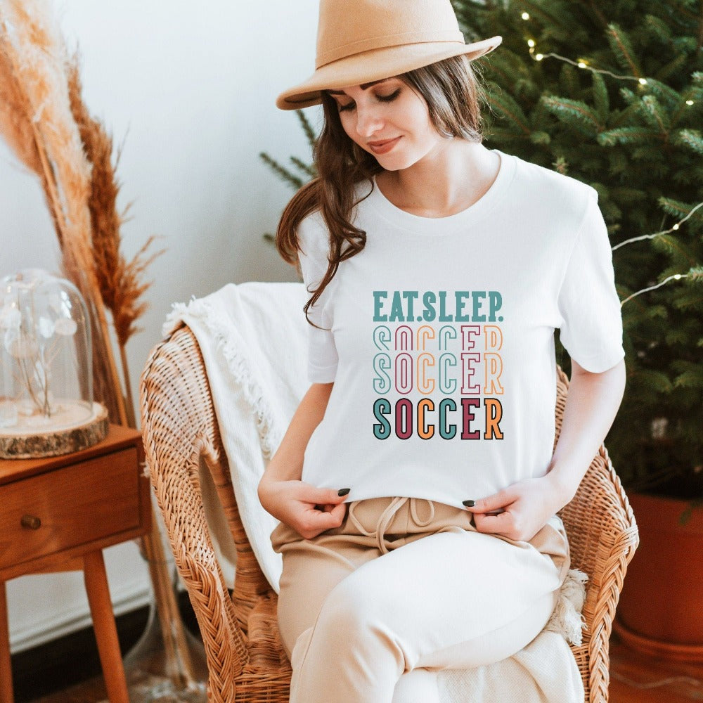 Eat, Sleep, Soccer shirt. It's always sports season depending on how you play. This playful soccer gift idea for your favorite athlete or soccer mom is bright and cheerful. Great for cheering on your team, getting ready for practice, heading out for a match and being the number one fan you have always been. Perfect soccer mom or dad outfit.